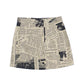 Tan mini skirt newspaper
